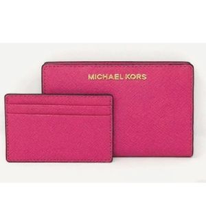 Michael Kors carry-all medium wallet. Deep pink, fuchsia. Plus card carrier